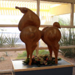 wooden horse sculpture in library