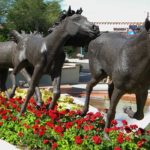 running horse statues