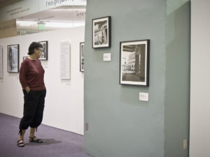 hurricane katrina exhibition with woman looking at images