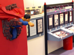 zap pow bam exhibition with superman wall sculpture